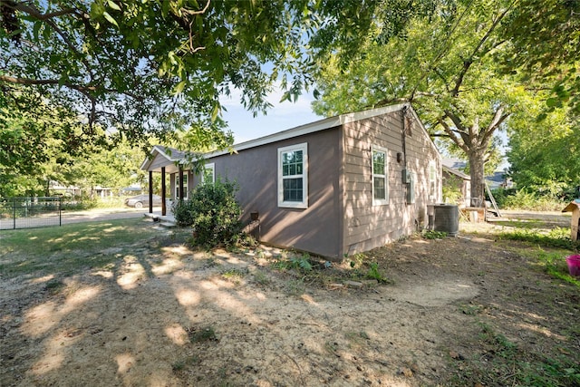 view of side of property featuring cooling unit