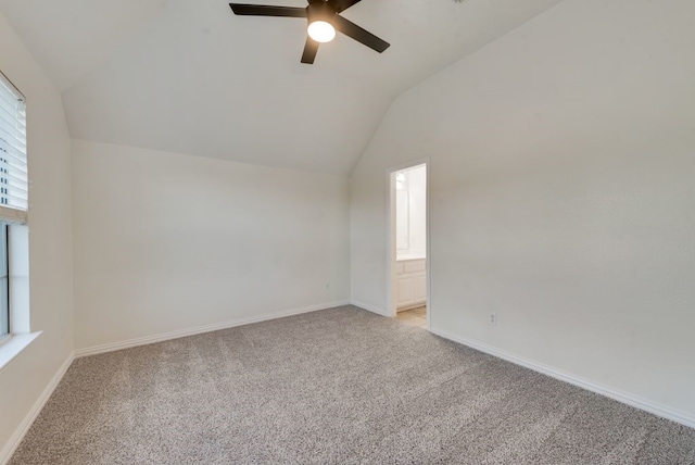 1005 Barre Meadow Ln, Mckinney, TX 75071 - spare room with lofted ceiling, light carpet, a ceiling fan, and baseboards