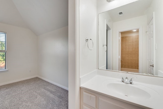 1005 Barre Meadow Ln, Mckinney, TX 75071 - full bath with baseboards, visible vents, vanity, vaulted ceiling, and a shower