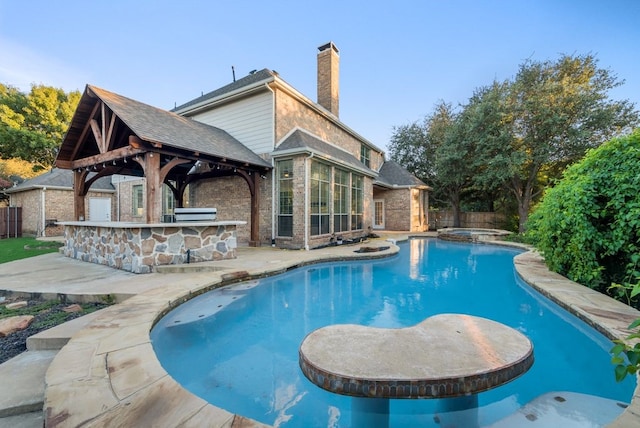 1005 Barre Meadow Ln, Mckinney, TX 75071 - view of swimming pool with a fenced backyard, a gazebo, a patio area, and outdoor dry bar