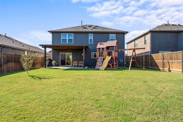 view of property featuring solar panels and a garage