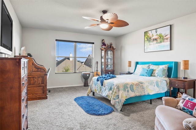 bedroom featuring ceiling fan and carpet floors