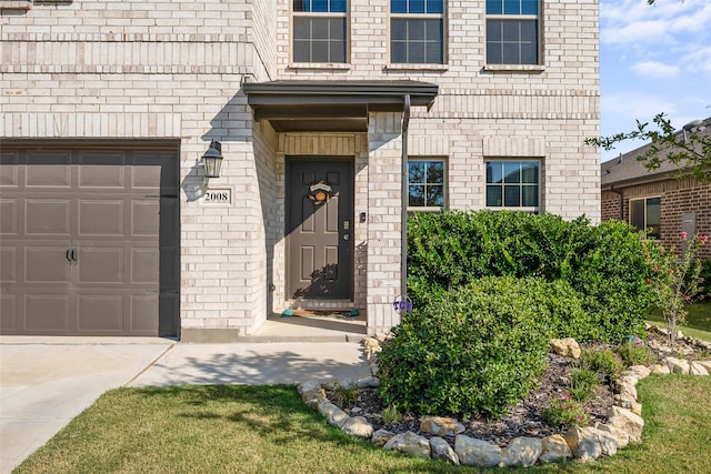 property entrance with a garage