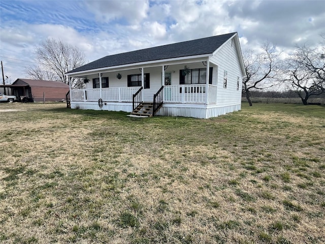 view of front of home featuring a porch and a front yard