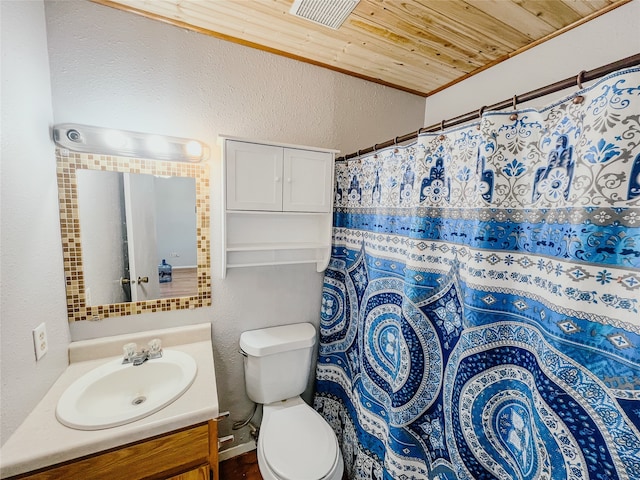 bathroom with vanity, wood ceiling, and toilet