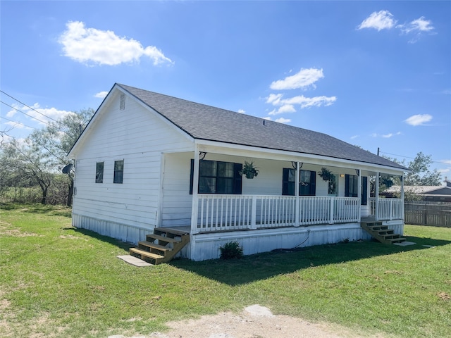 view of front of home with a front lawn and a porch