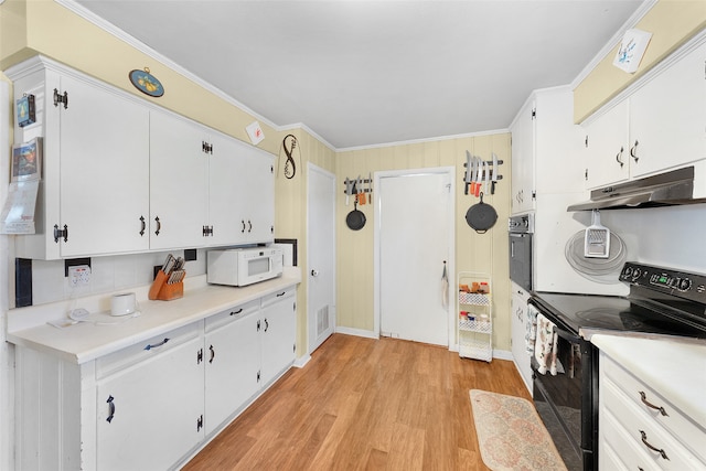 kitchen featuring white cabinets, crown molding, light hardwood / wood-style floors, and electric range