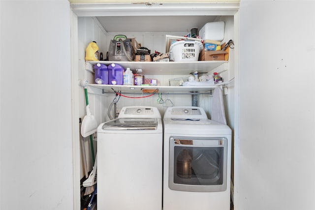 washroom with independent washer and dryer