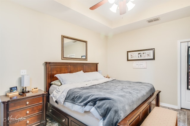 bedroom featuring ceiling fan and hardwood / wood-style flooring