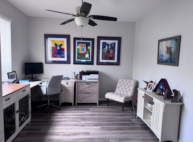 office with dark wood-type flooring and ceiling fan