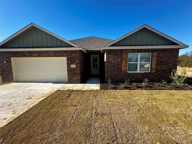 ranch-style house featuring a garage and a front yard