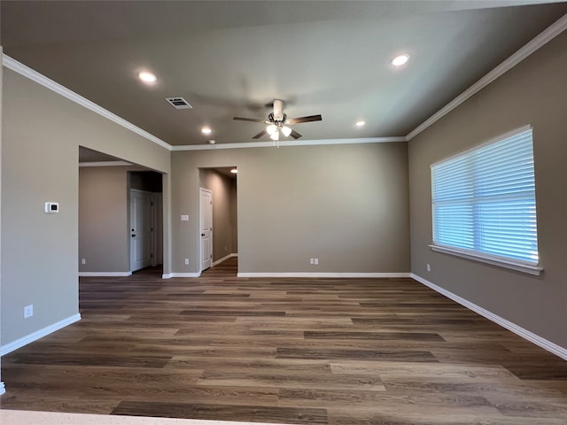 empty room featuring crown molding, ceiling fan, and dark wood-type flooring