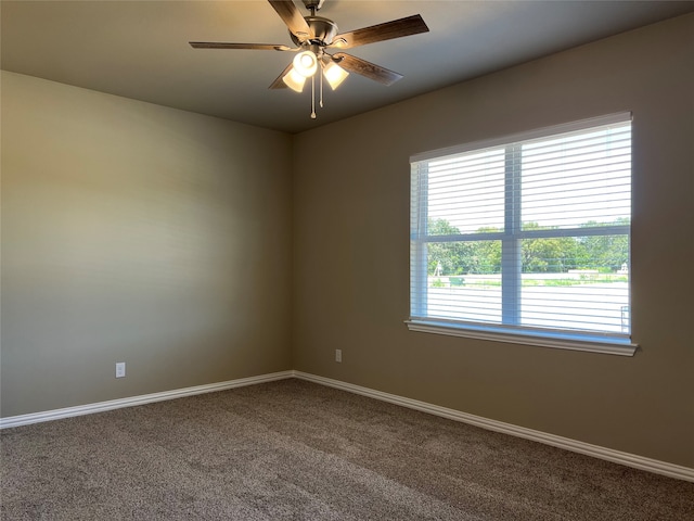 unfurnished room with carpet and ceiling fan