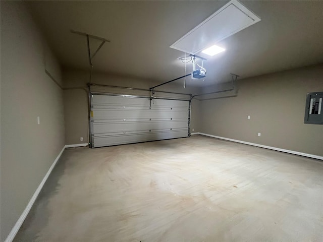 100 Levi Dr, Cleburne, TX 76031 - garage featuring a garage door opener, electric panel, and baseboards