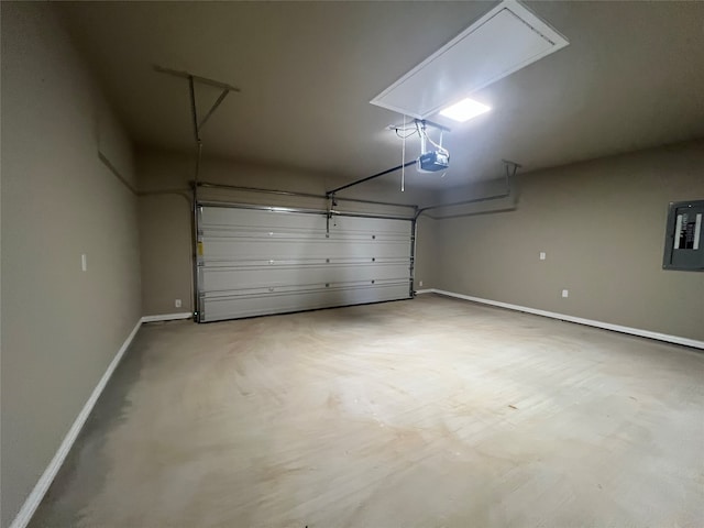 garage with electric panel and a garage door opener