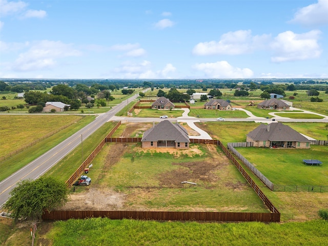 birds eye view of property featuring a rural view