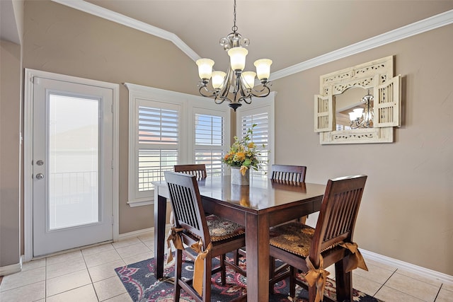 tiled dining space featuring ornamental molding, vaulted ceiling, and a notable chandelier