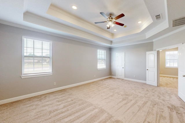 unfurnished bedroom featuring ornamental molding and multiple windows