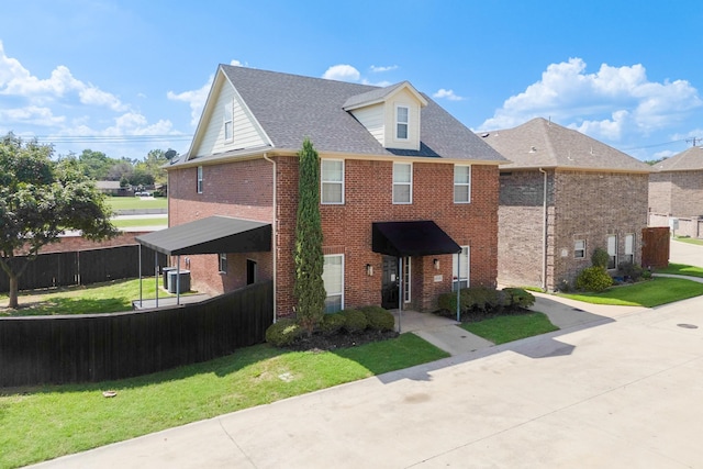 view of front facade featuring cooling unit, a carport, and a front lawn