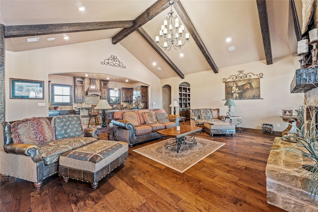 living room featuring high vaulted ceiling, a stone fireplace, dark hardwood / wood-style flooring, beamed ceiling, and a chandelier