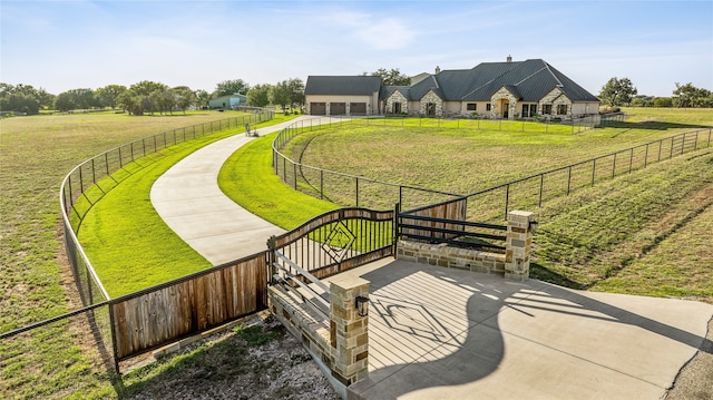 surrounding community featuring a rural view and a yard