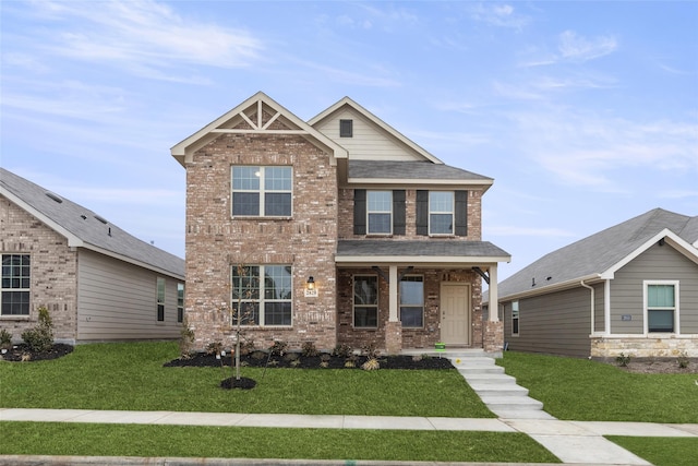 craftsman house with a front lawn