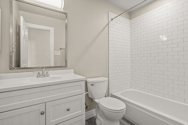 full bathroom with vanity, toilet, and tiled shower / bath