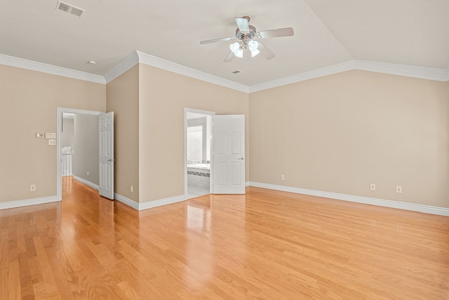 unfurnished bedroom featuring ornamental molding, vaulted ceiling, ceiling fan, and light hardwood / wood-style flooring