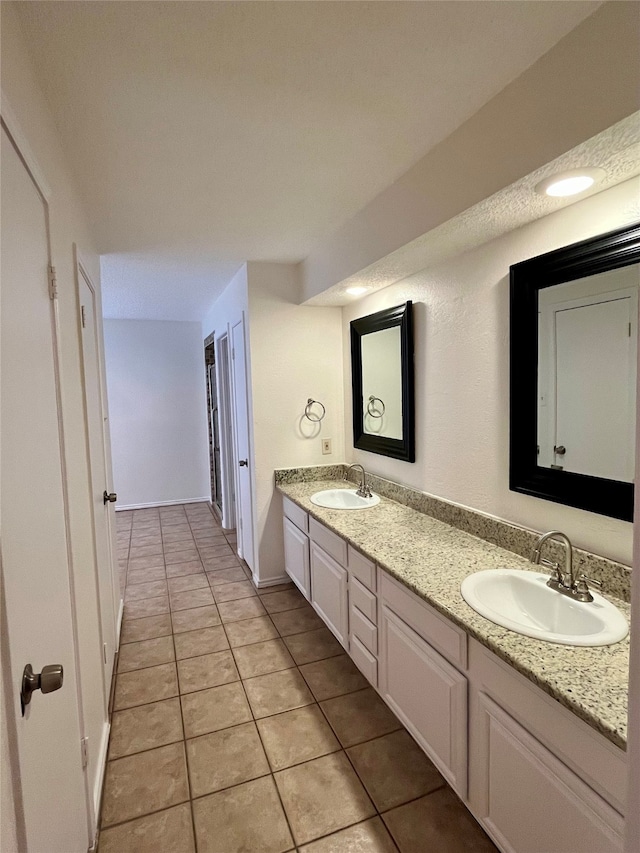 bathroom with vanity and tile patterned floors