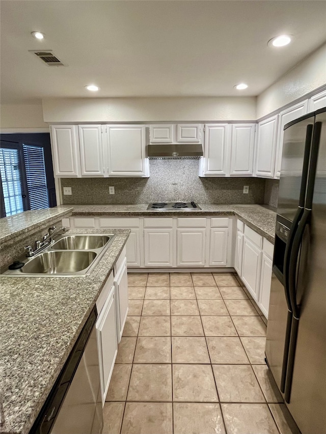 kitchen with tasteful backsplash, sink, white cabinetry, stainless steel appliances, and exhaust hood