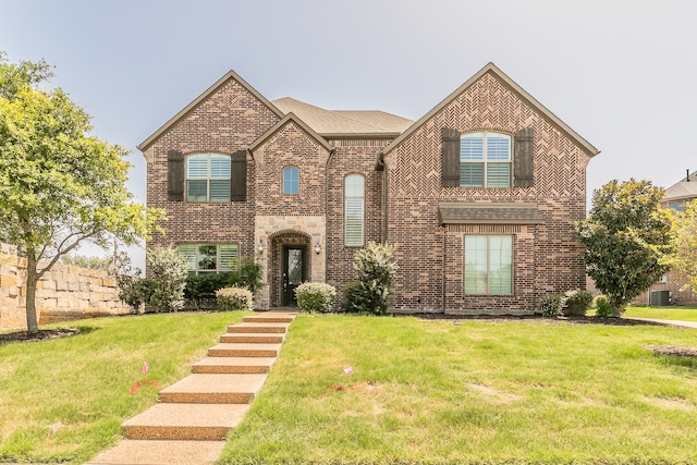 view of front of home featuring a front lawn