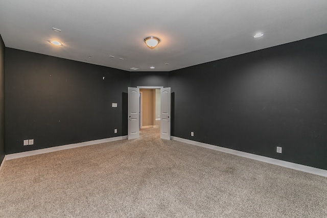 unfurnished room with carpet floors