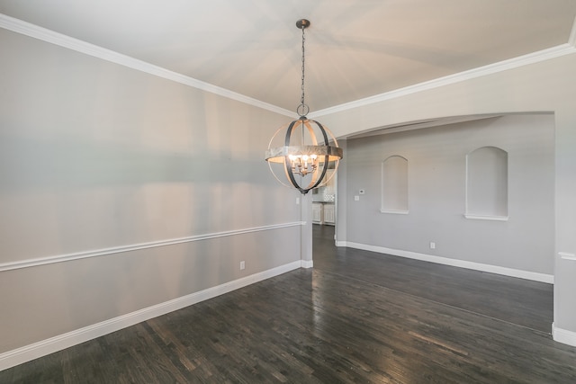 interior space featuring an inviting chandelier, dark hardwood / wood-style floors, and crown molding