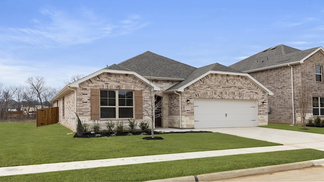 craftsman inspired home with a garage and a front yard