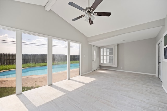 spare room featuring beam ceiling, ceiling fan, and high vaulted ceiling