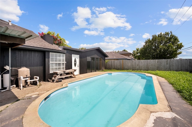 view of swimming pool featuring a patio