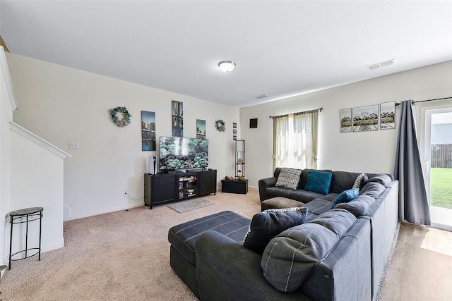 living room with light carpet