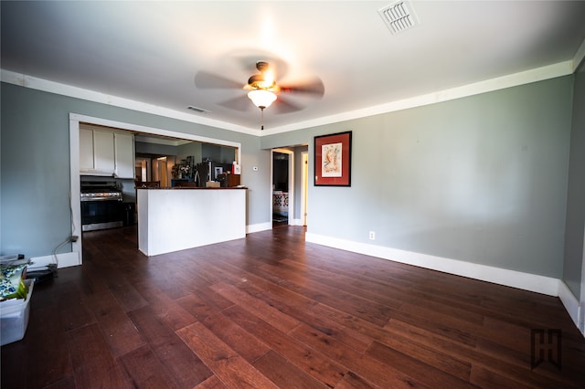 unfurnished living room with ceiling fan and dark hardwood / wood-style floors