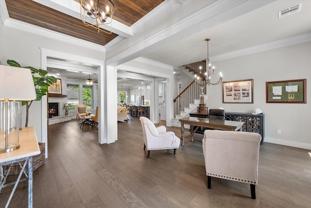 dining area with dark hardwood / wood-style floors, wood ceiling, and ornamental molding