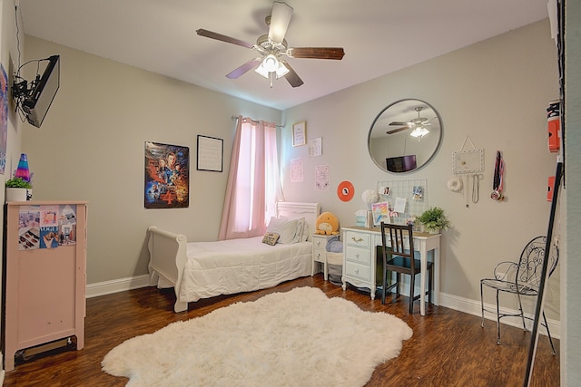 bedroom featuring dark wood-type flooring and ceiling fan