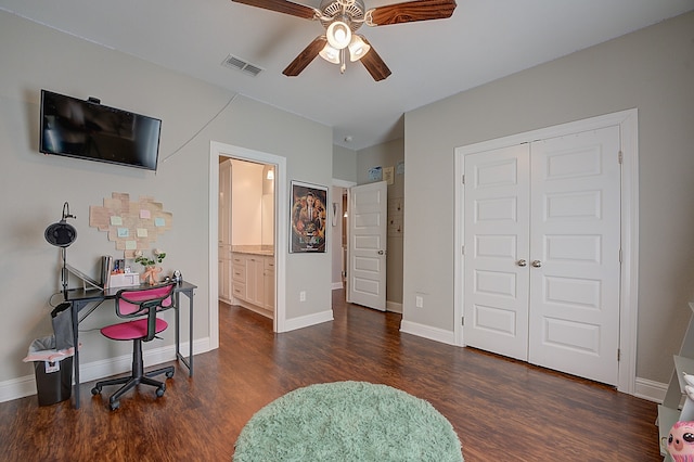 office space with ceiling fan and dark hardwood / wood-style floors