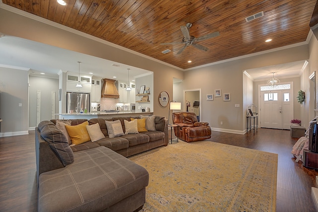 living room featuring wooden ceiling, ceiling fan with notable chandelier, crown molding, and dark hardwood / wood-style floors