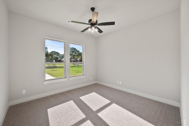 spare room with carpet flooring and ceiling fan