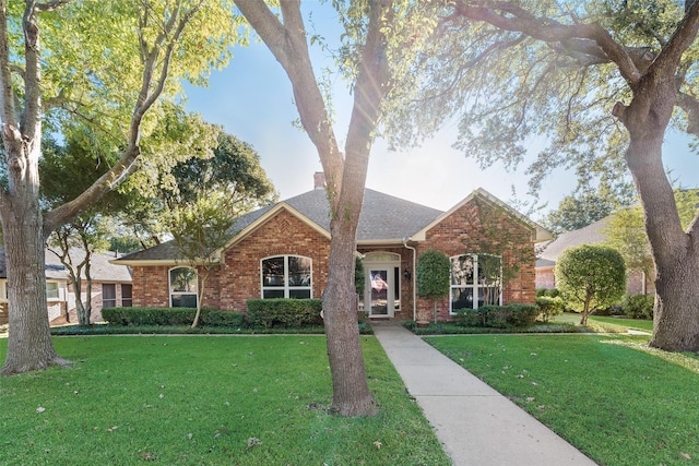 view of front of house with a front lawn