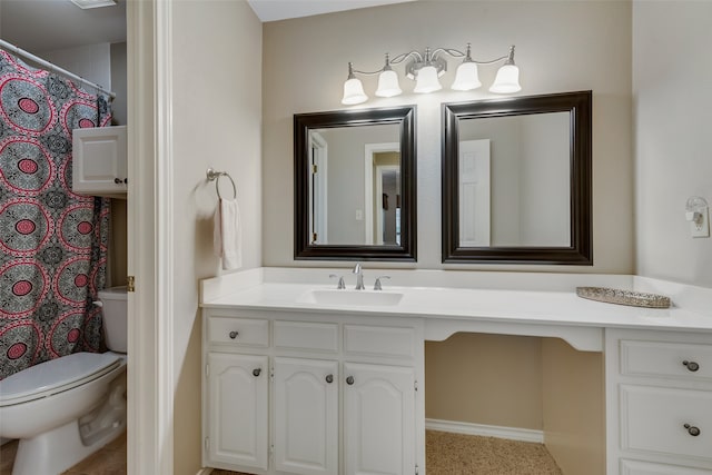 bathroom with vanity and toilet