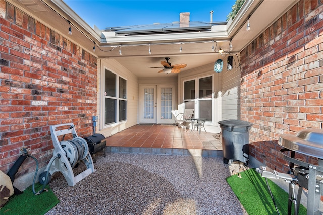 view of patio / terrace with ceiling fan and a grill