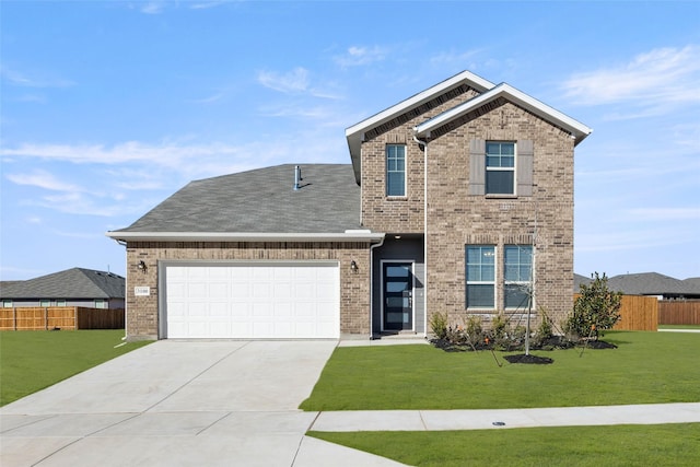 view of front facade with a garage and a front lawn