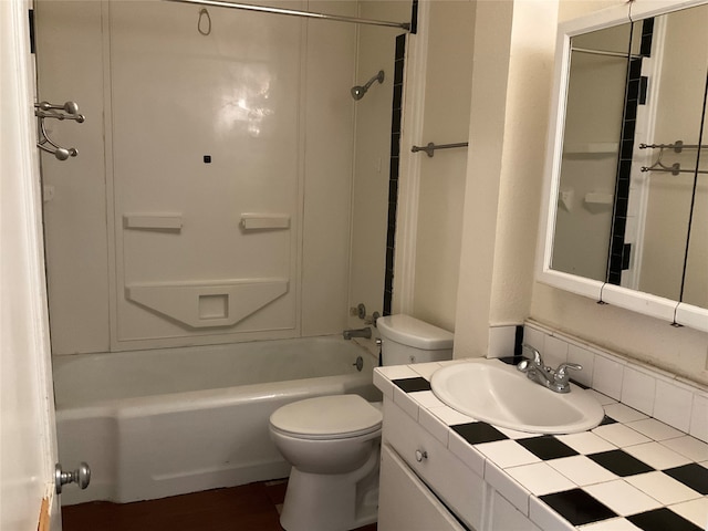 full bathroom with vanity, bathing tub / shower combination, and toilet