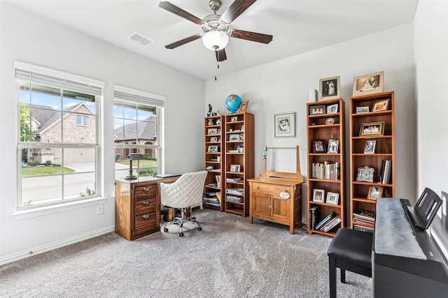 office area featuring ceiling fan and carpet floors