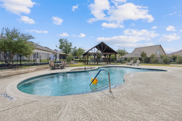 view of pool with a gazebo and a patio area